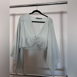 Sea green knotted cropped top with vented long sleeves